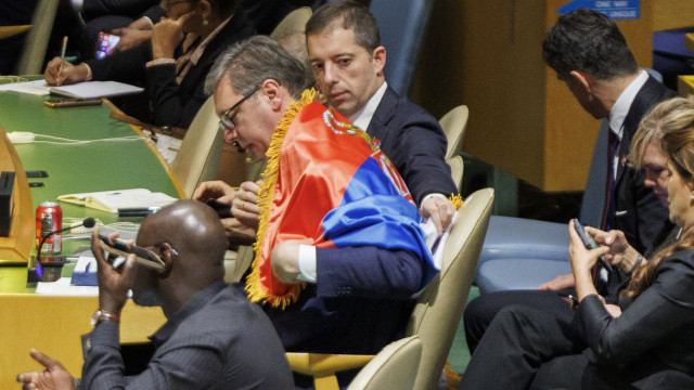 Aleksandar Vucic wears a Serbian flag after the General Assembly voted and passed a resolution to create an International Day of Remembrance for victims of the Srebrenica genocide  23 05 2024